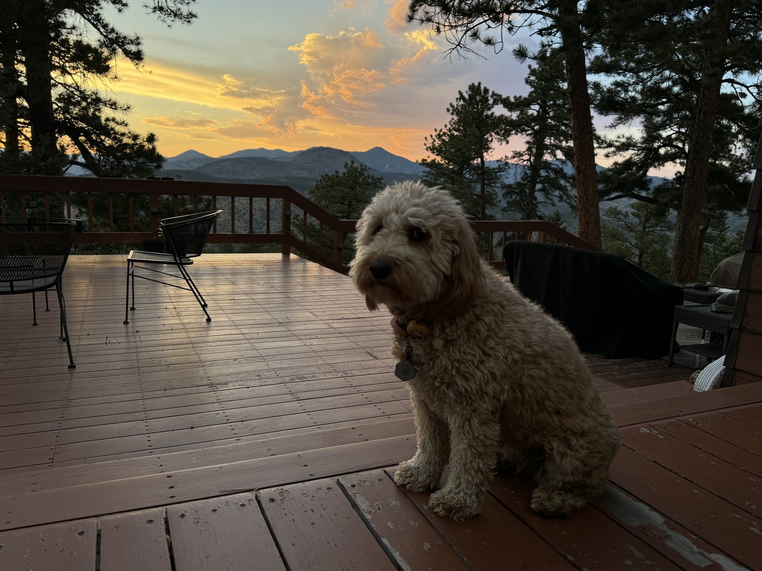 The deck at dusk with the mountains catching the last light